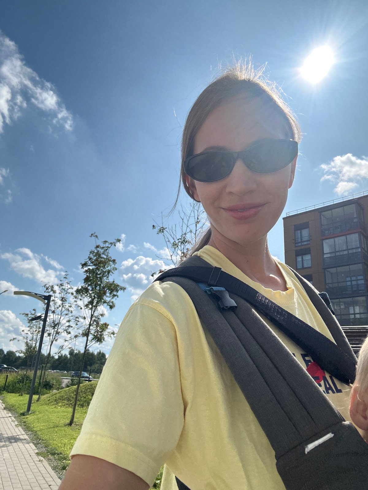 Sunny morning in Vsevolozhsk near a dome and construction site