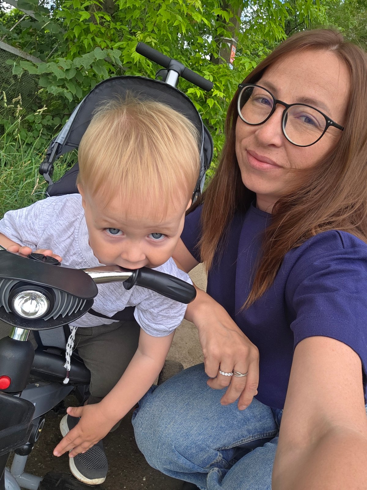Toddler's morning walk in Chaikovsky: daisies, snails, and stickers
