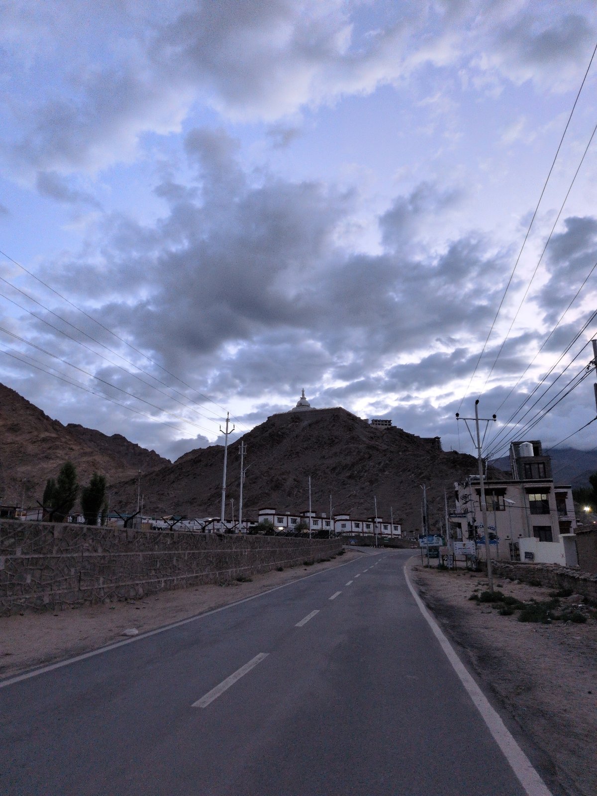 Leh at dusk: mountain roads, street art, and construction