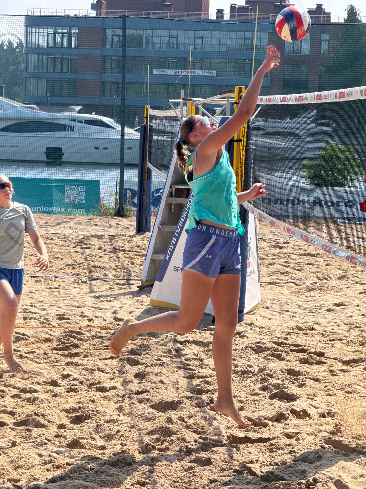 Beach volleyball and waterfront life on a sunny Saint Petersburg afternoon