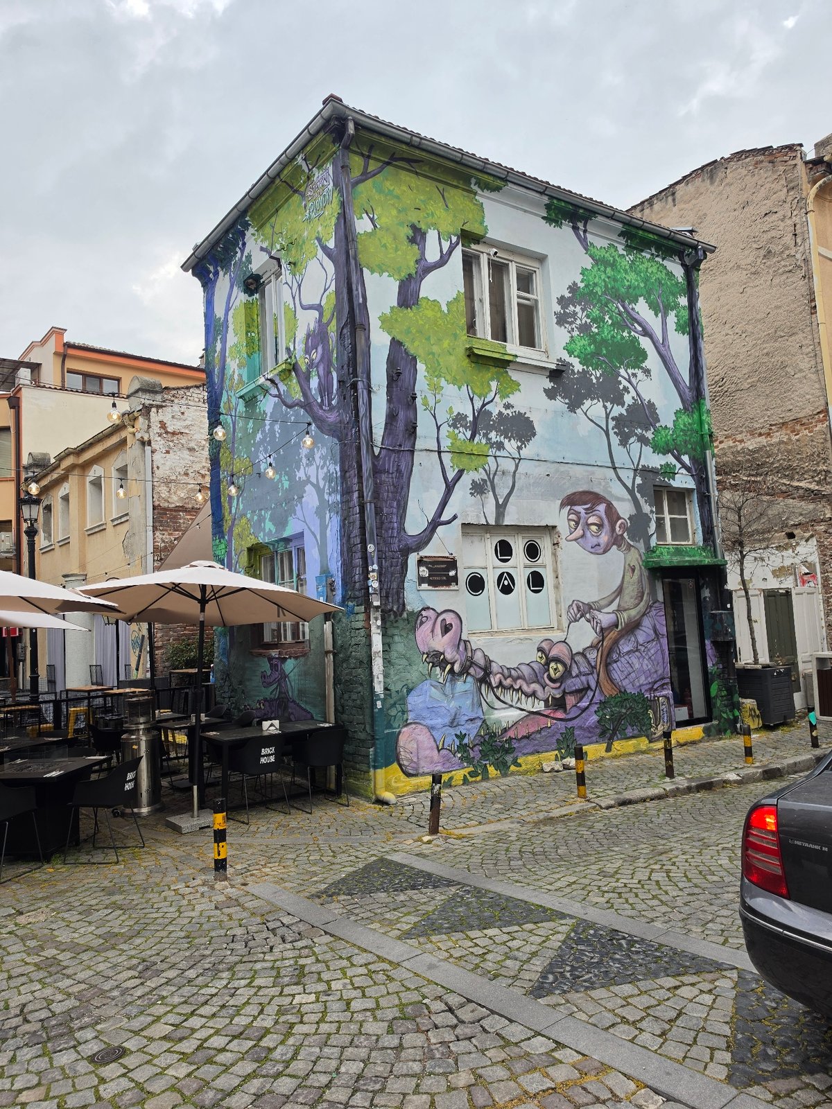 Tourist explores historic Plovdiv landmarks and dining areas