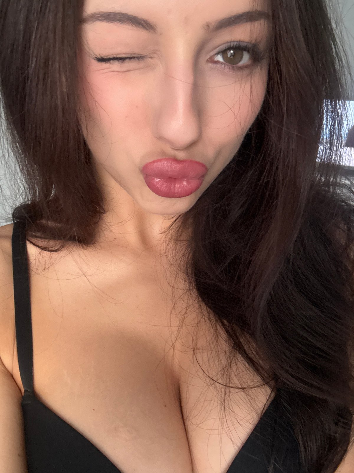 Woman takes playful selfies in Sofia
