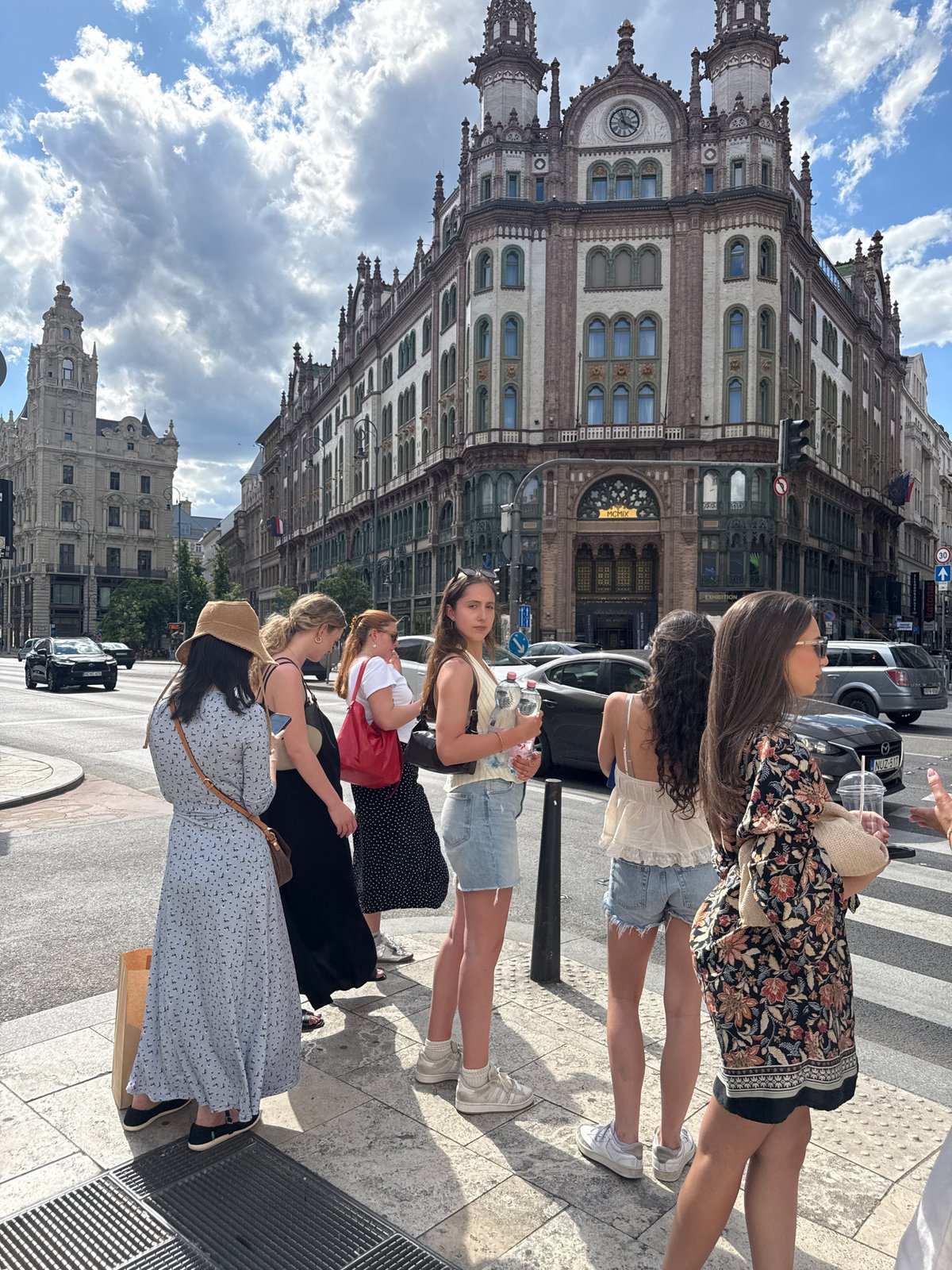 Budapest street life captured near Gresham Palace intersection