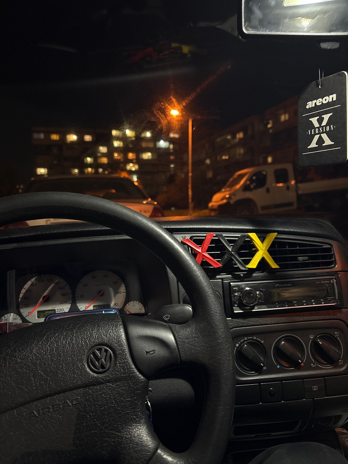 Nighttime view captured inside Volkswagen vehicle dashboard area