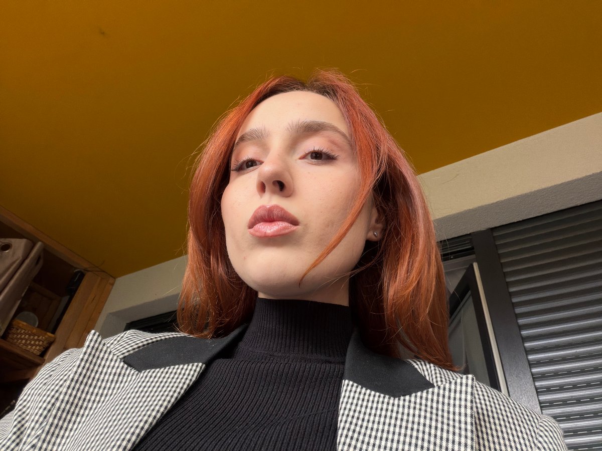 Person in checkered jacket photographed in Strasbourg