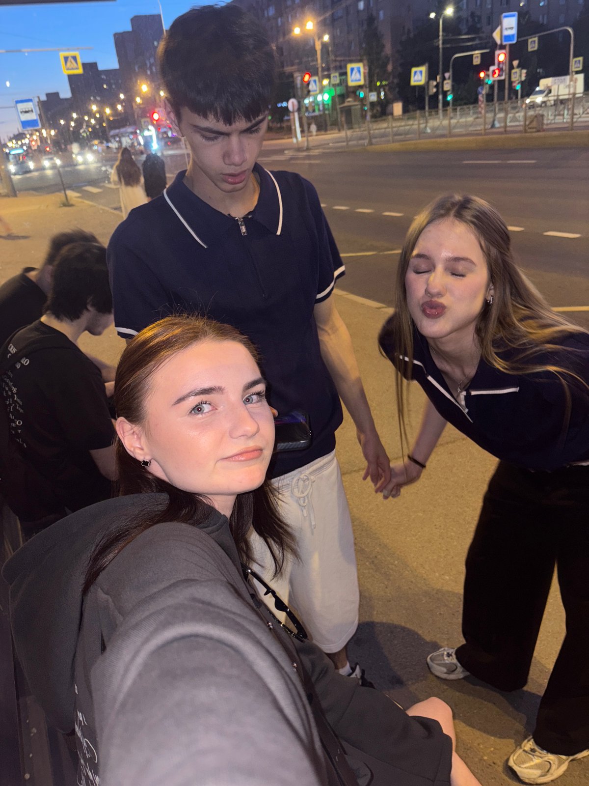 Young people socialize, take selfies during evening in Ladozhskoe Ozero