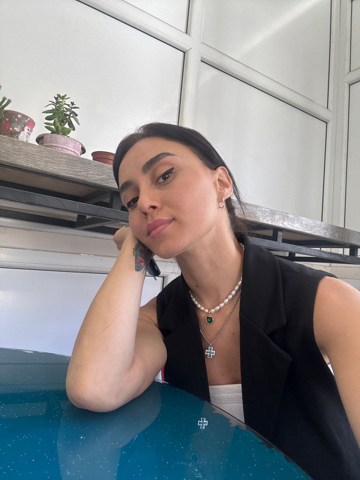 Selfie session at outdoor table in Tbilisi