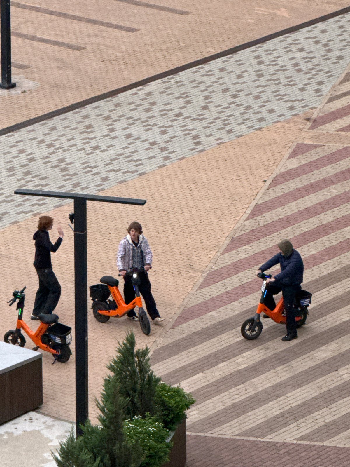 Everyday moments captured across Khimki including scooters and selfies