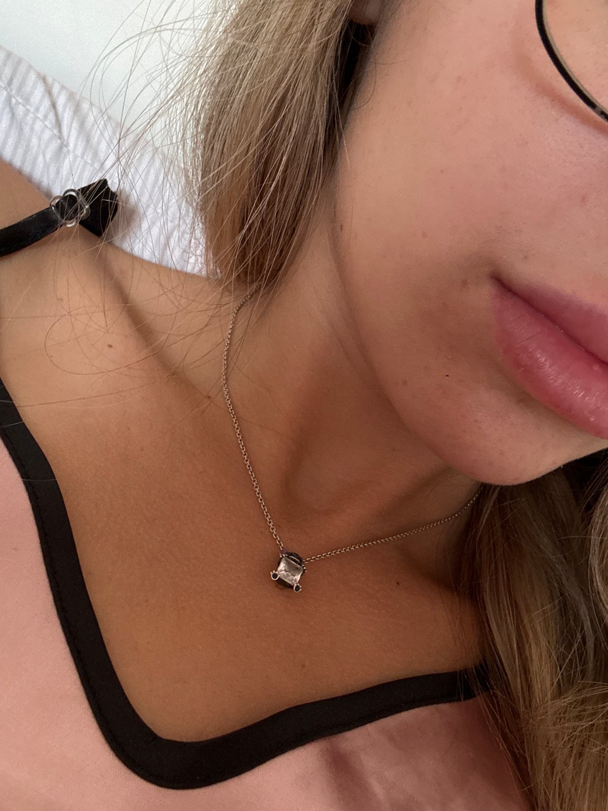 Silver pendant necklace showcased in Nesebar, Bulgaria
