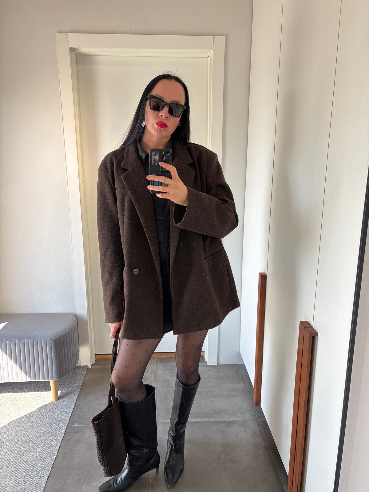 Woman takes mirror selfies in Chaikovsky, Russia