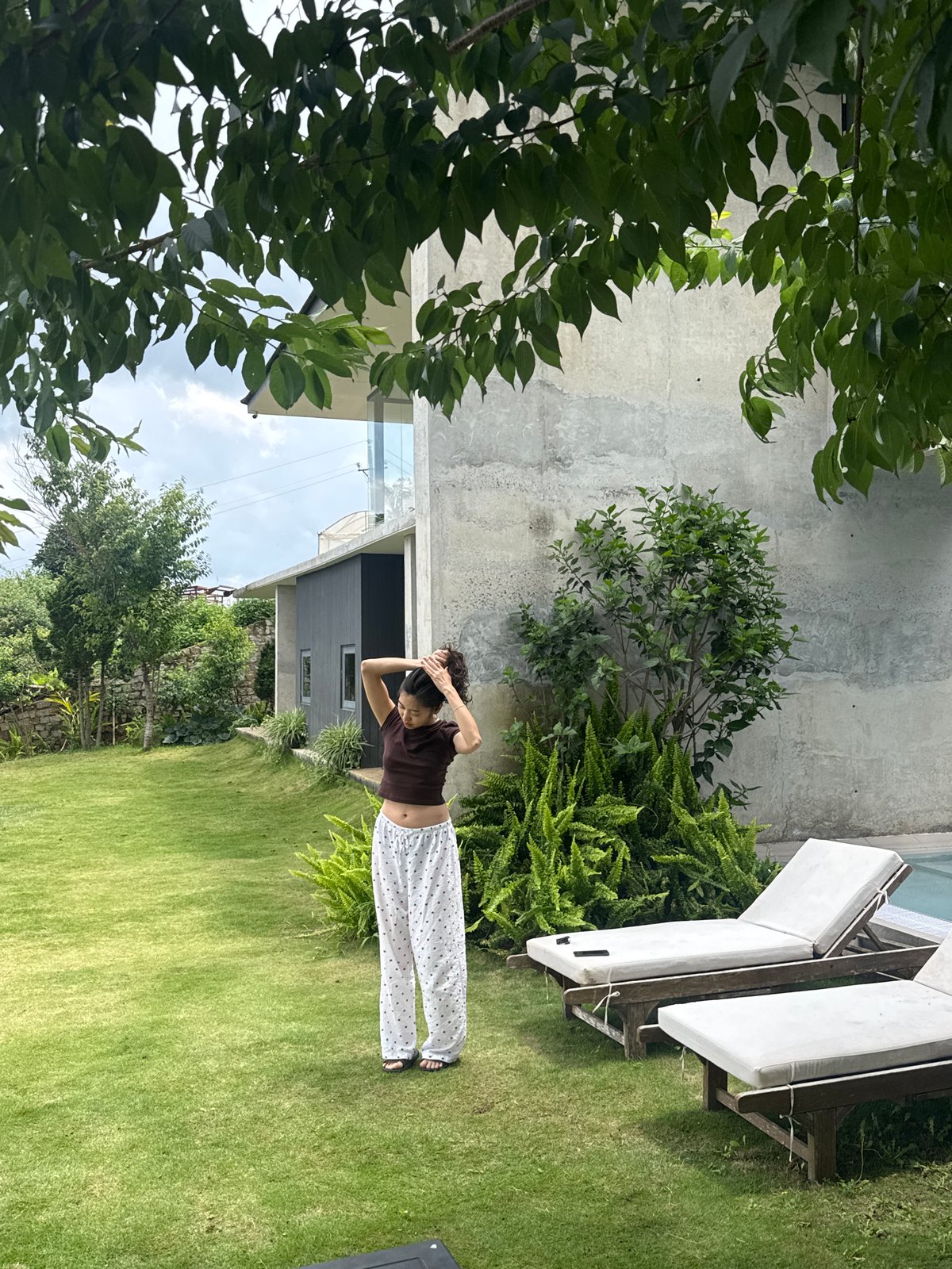 Modern property and hillside wind turbines in Đa Lộc, Vietnam