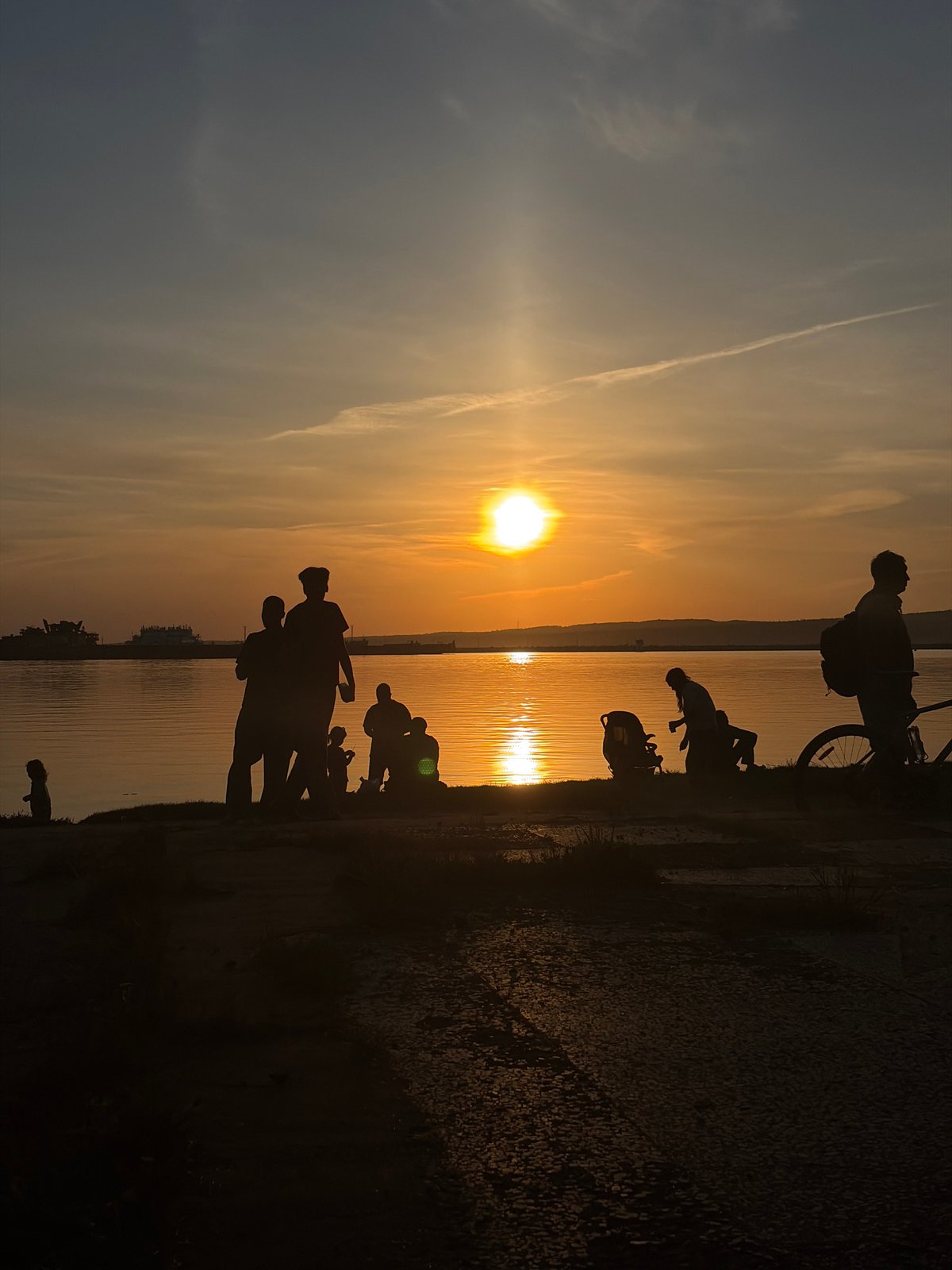 Evening sunset gathering draws crowds to Kama River in Chaikovsky
