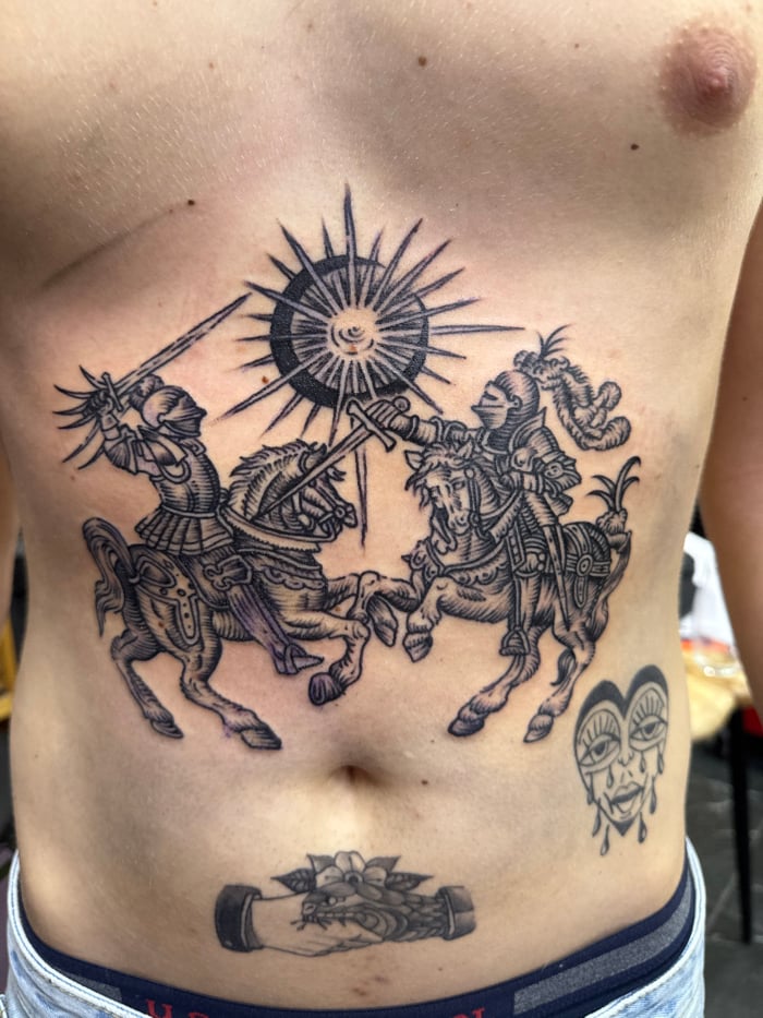 Tattooed torso documented in Moscow street photography