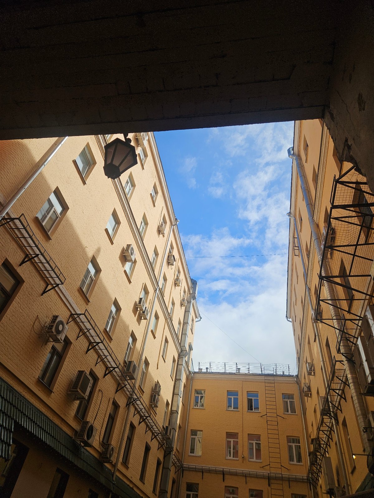 Moscow courtyard buildings photographed from below angle