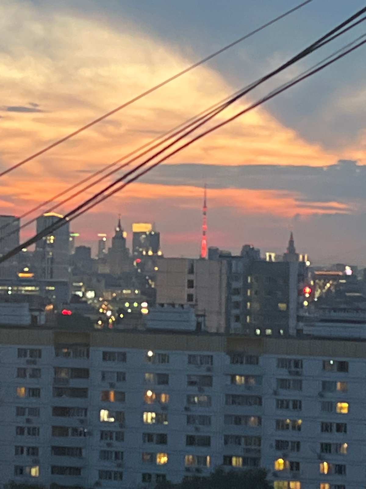 City skyline observed under dramatic sunset conditions