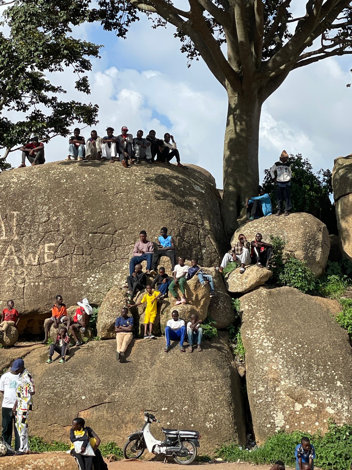 Soccer training session among Jos's rocky granite terrain