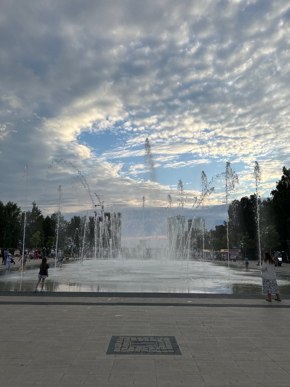 Summer afternoon at Izhevsk's public fountain plaza