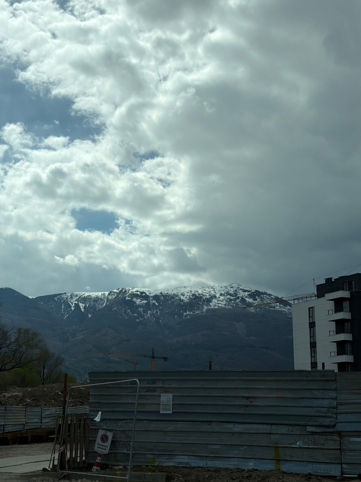 Landscape photo captured in Sofia showing mountains and construction