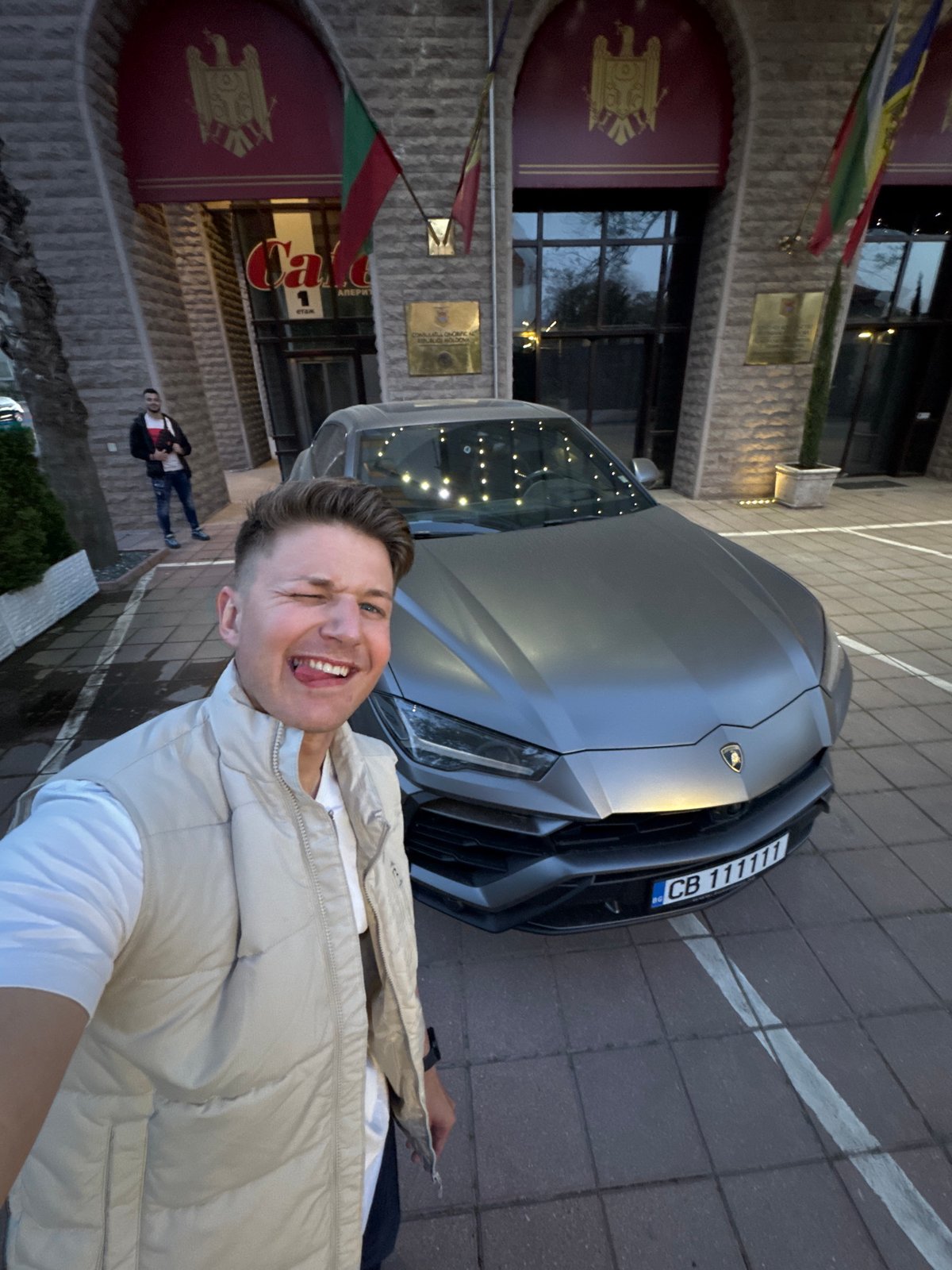 Young man poses with luxury Lamborghini in Plovdiv Bulgaria
