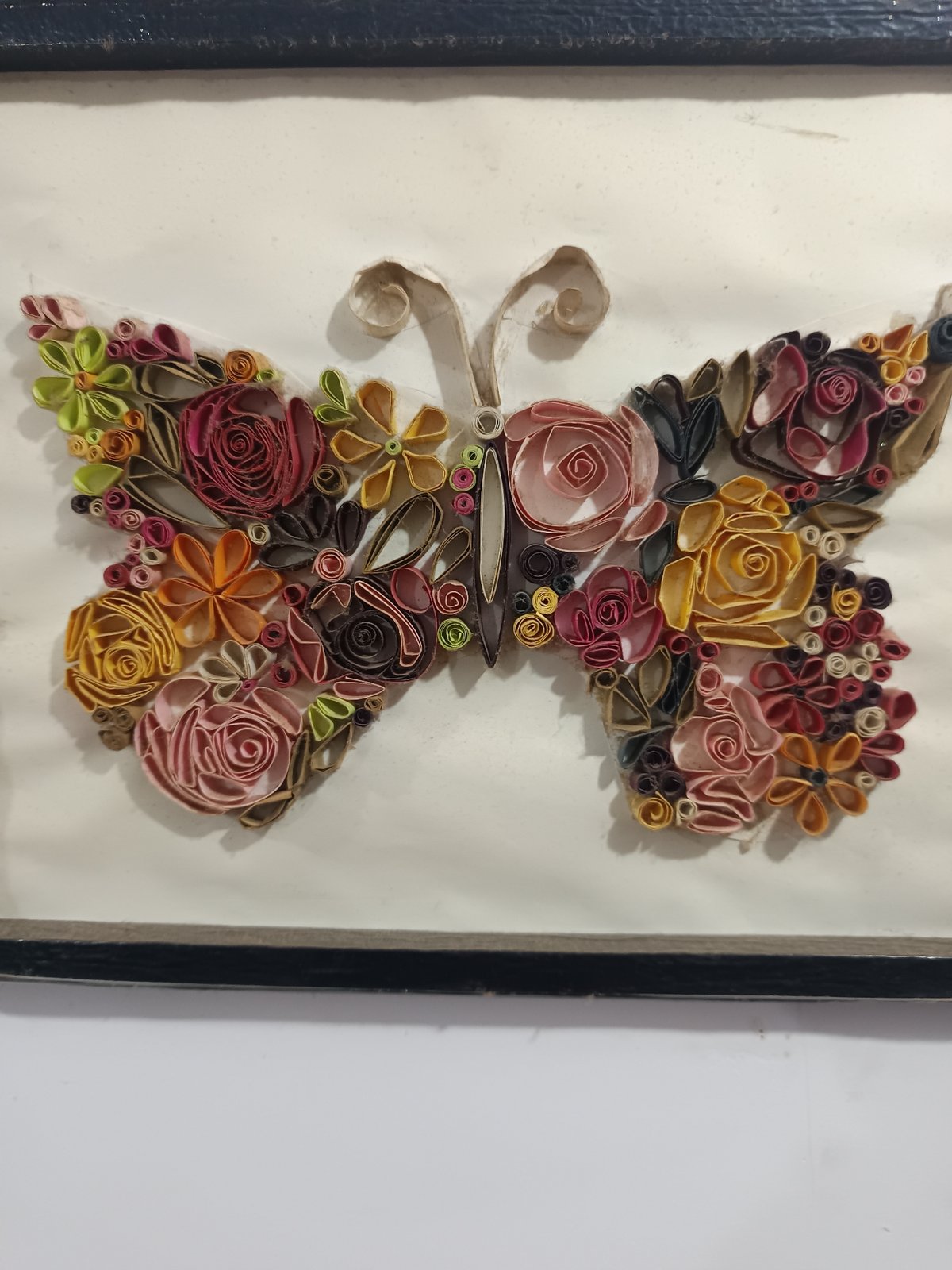 Art collection featuring butterfly, Chaplin portrait observed in Chopdem