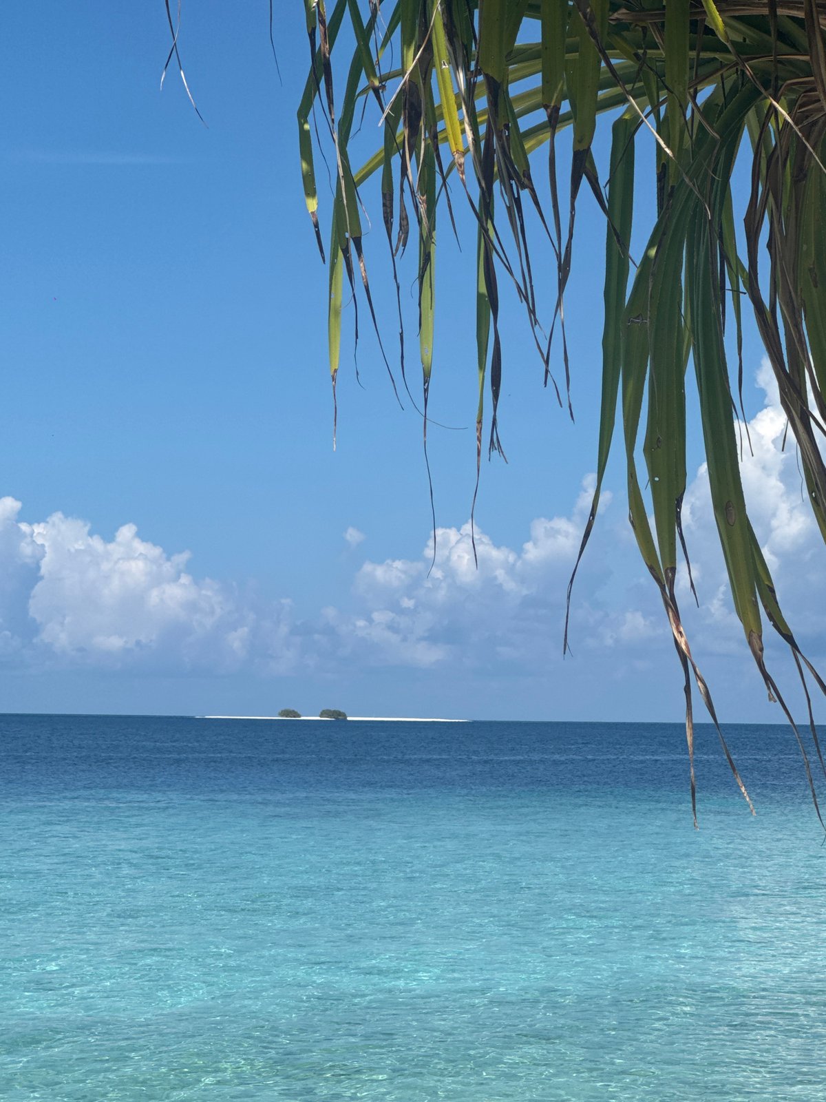 Beach scenes captured in Ukulhas, Maldives showing shade structure