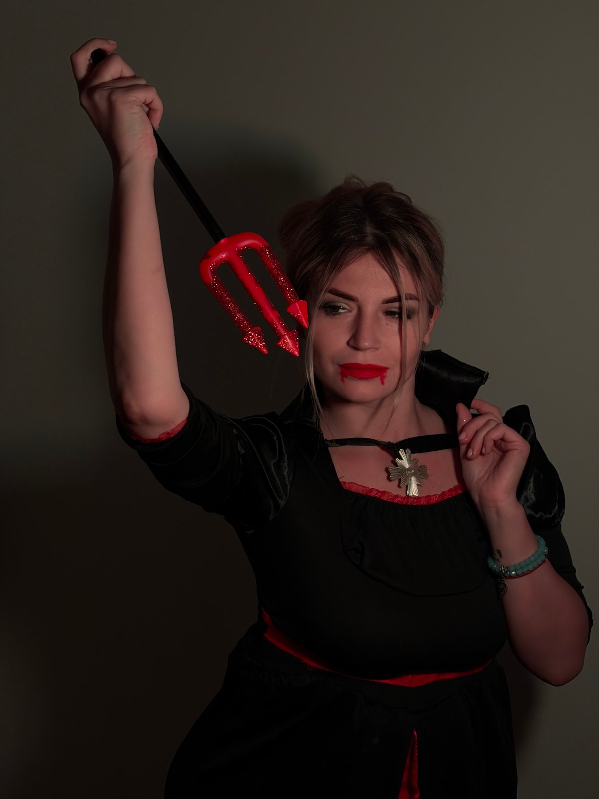 Woman poses for vampire costume portraits in Budva