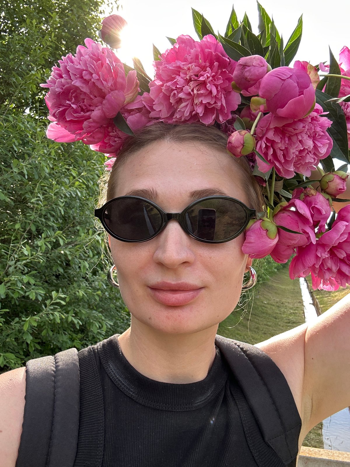 Peony crown selfies by a water channel in Chaikovsky