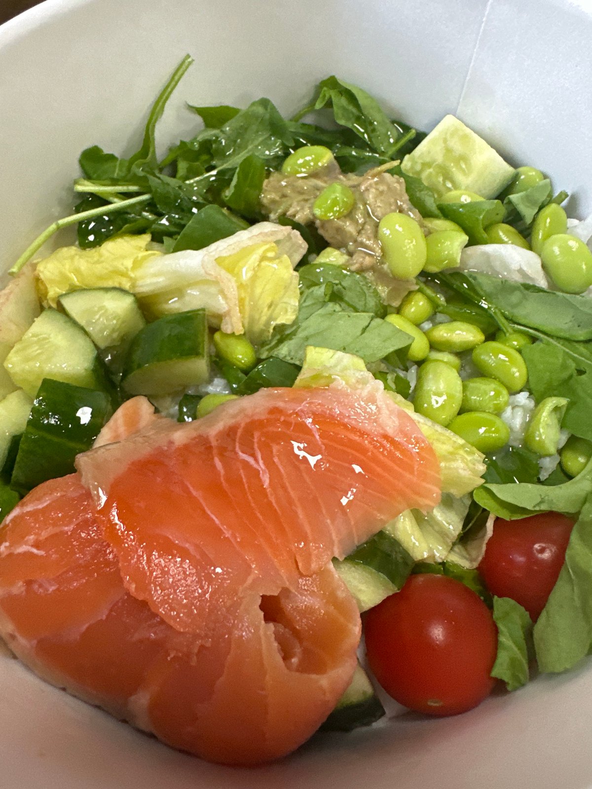 Salmon poke bowl, close up and overhead in Moscow