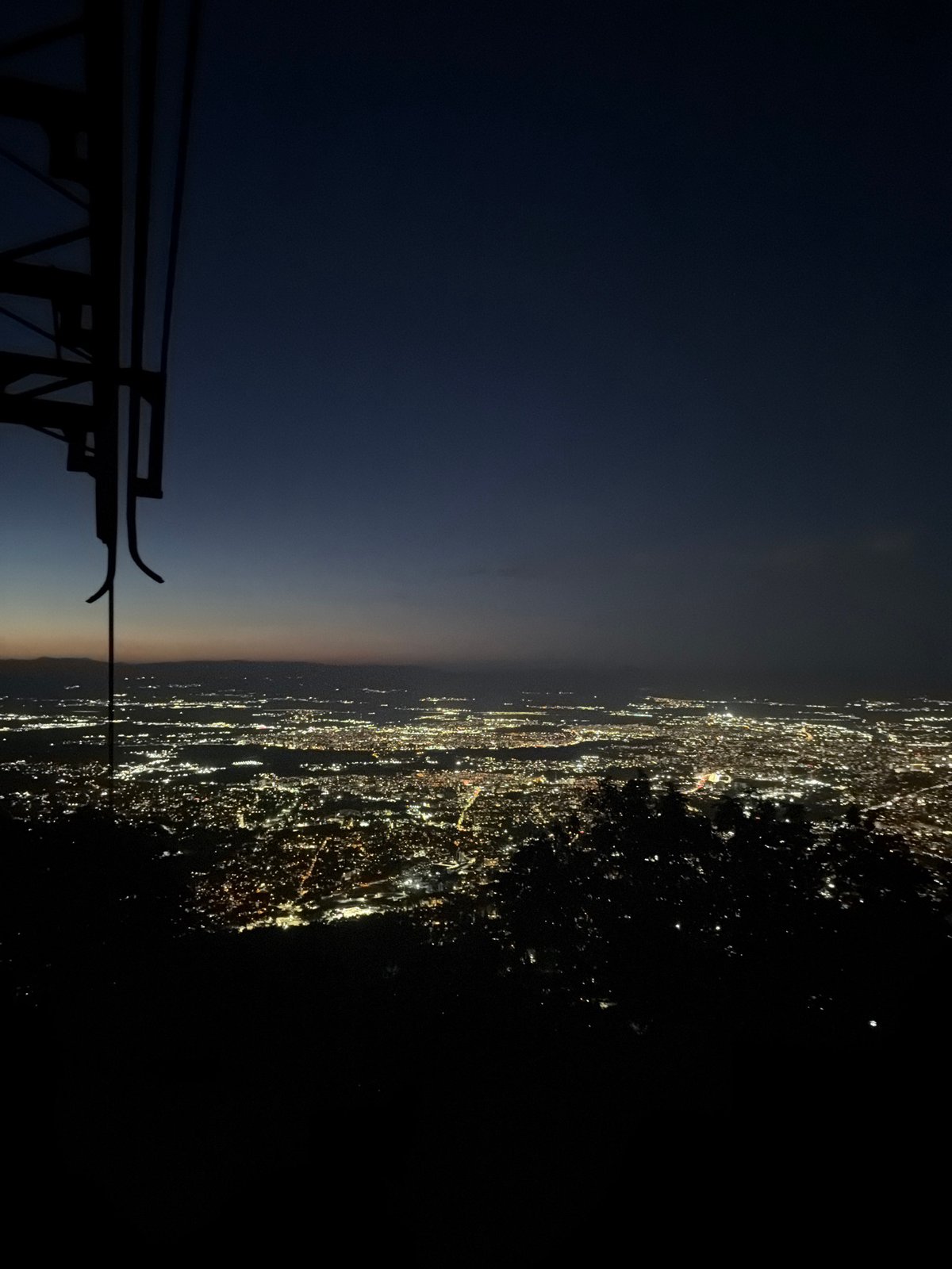 Sofia's nighttime cityscape glows from above
