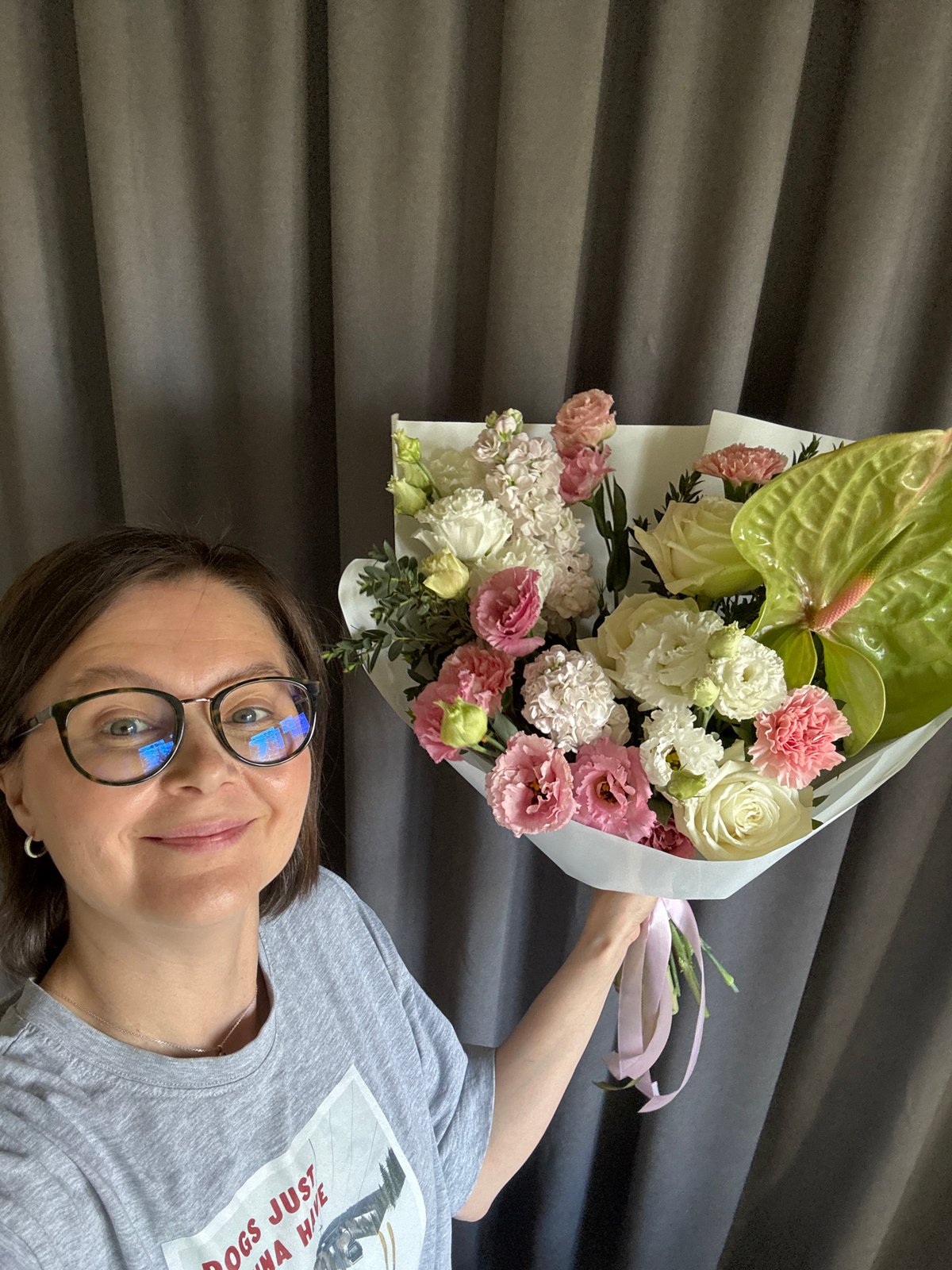 Woman receives flower bouquet, shares domestic moments in Izhevsk