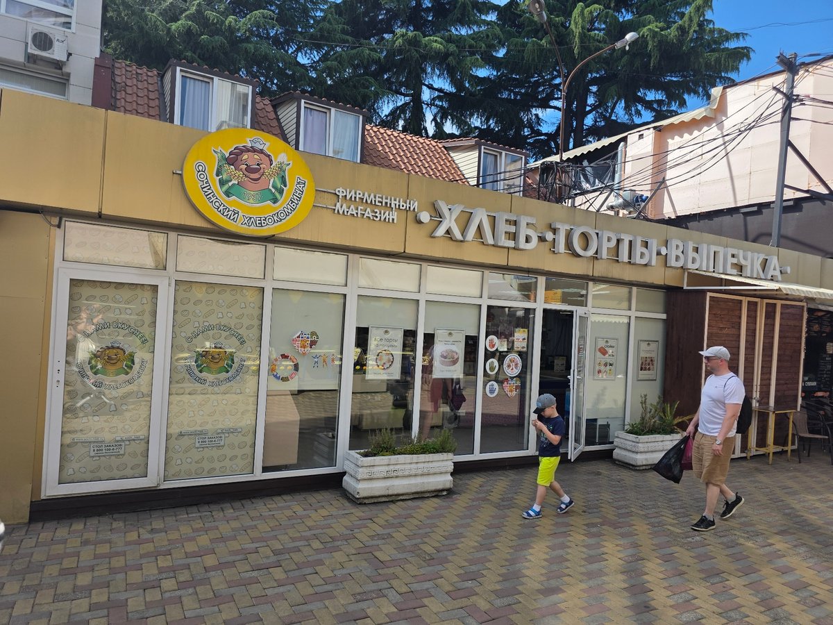 Tourist explores Sochi markets and streets during midday stroll