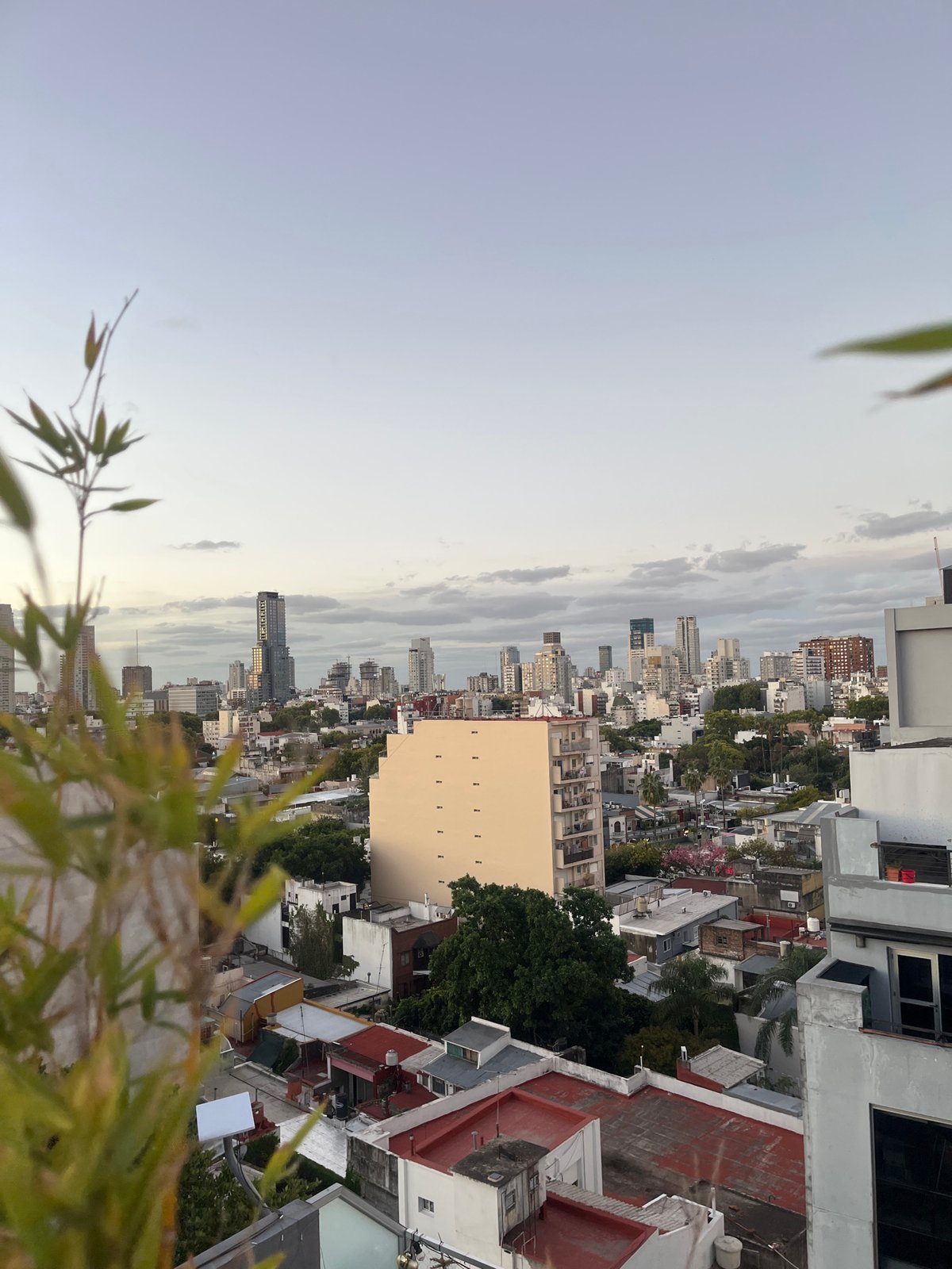 Buenos Aires cityscape viewed from high-rise rooftop Saturday evening