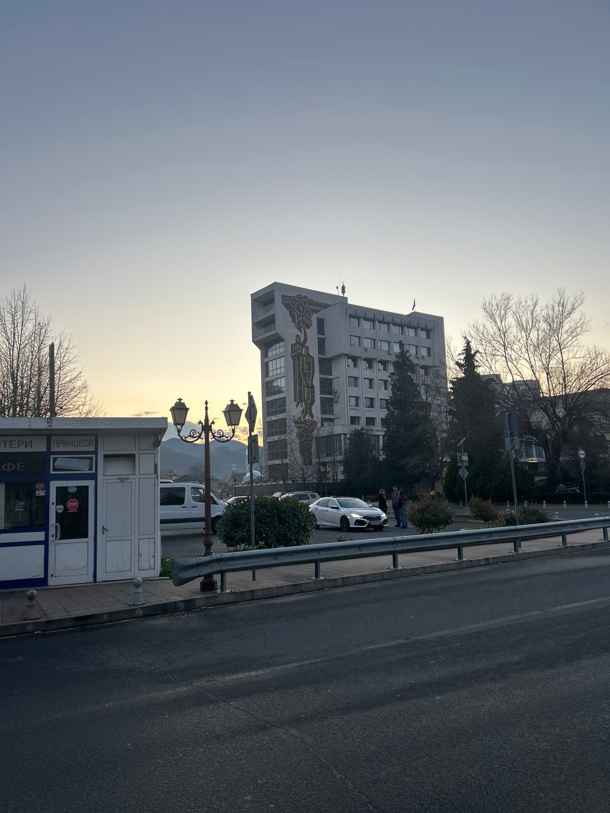 Afternoon scenes captured in Zlatograd: buildings, streets, dog encounter