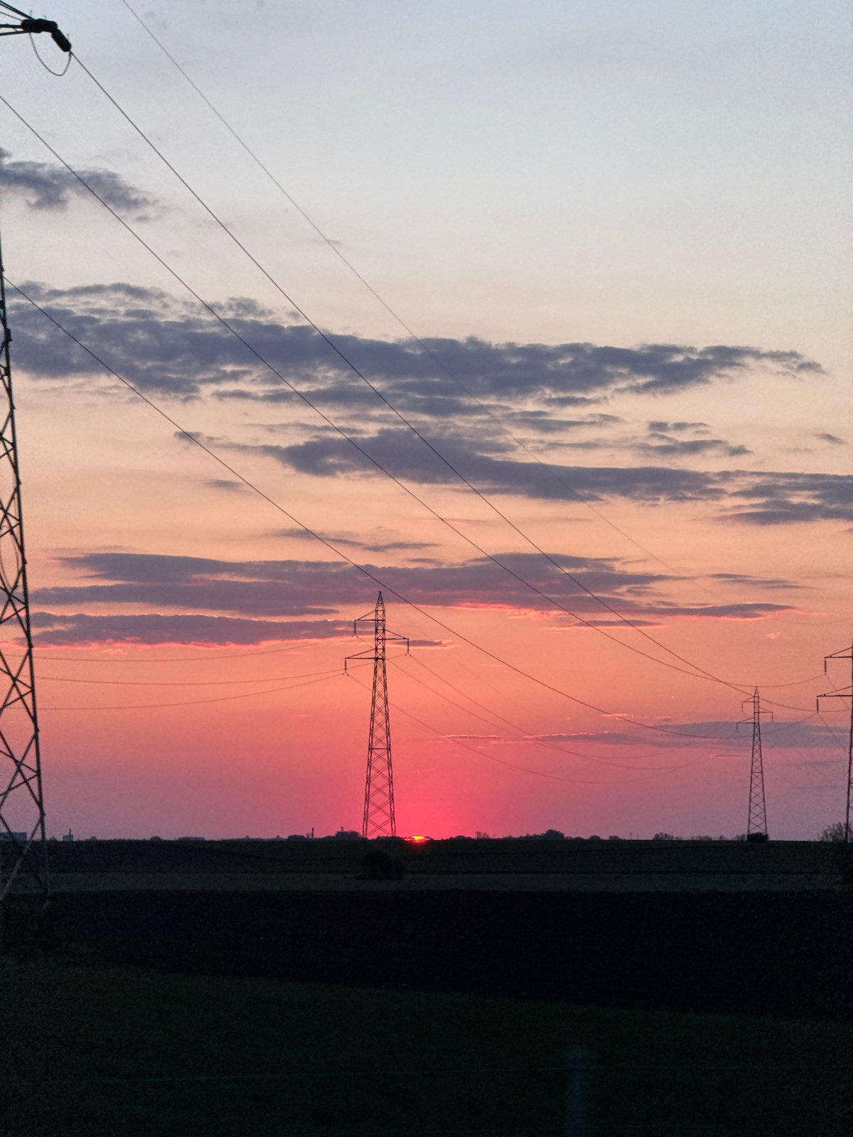 Sunset observed over rural Serbia agricultural landscape April 22