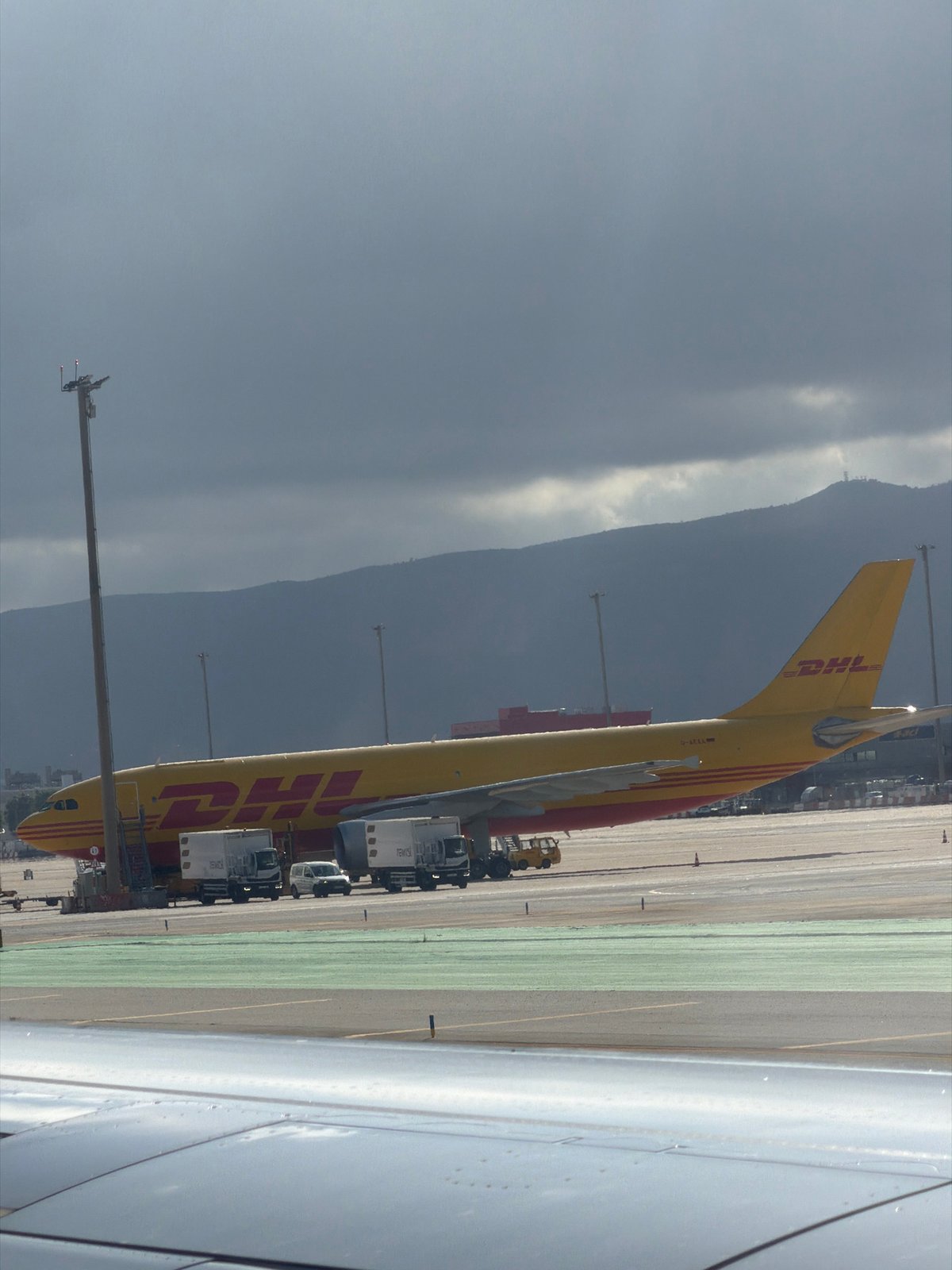Passenger documents routine airport operations at Barcelona-El Prat Airport