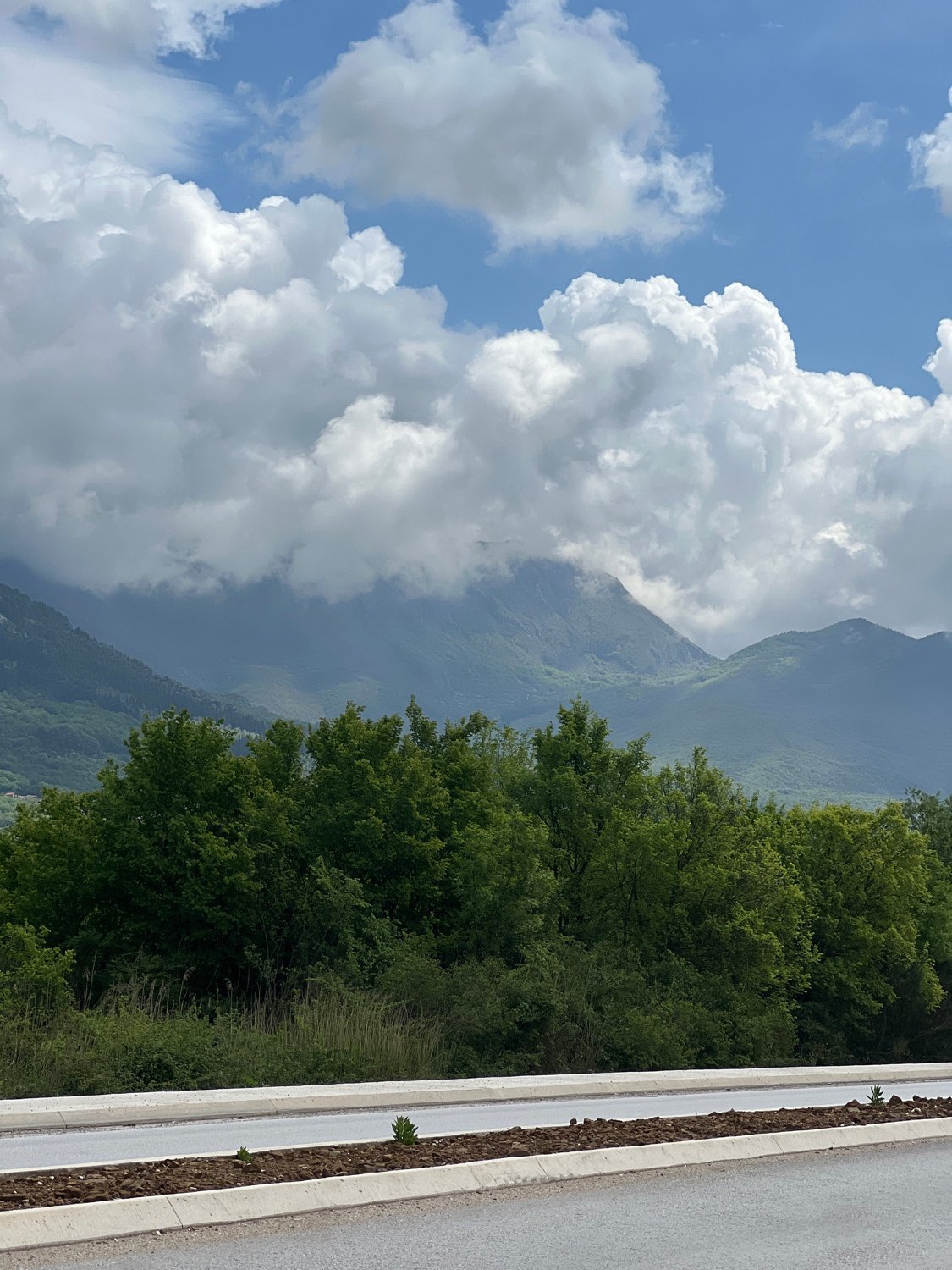 Dynamic cloudy skies photographed over Montenegro mountains
