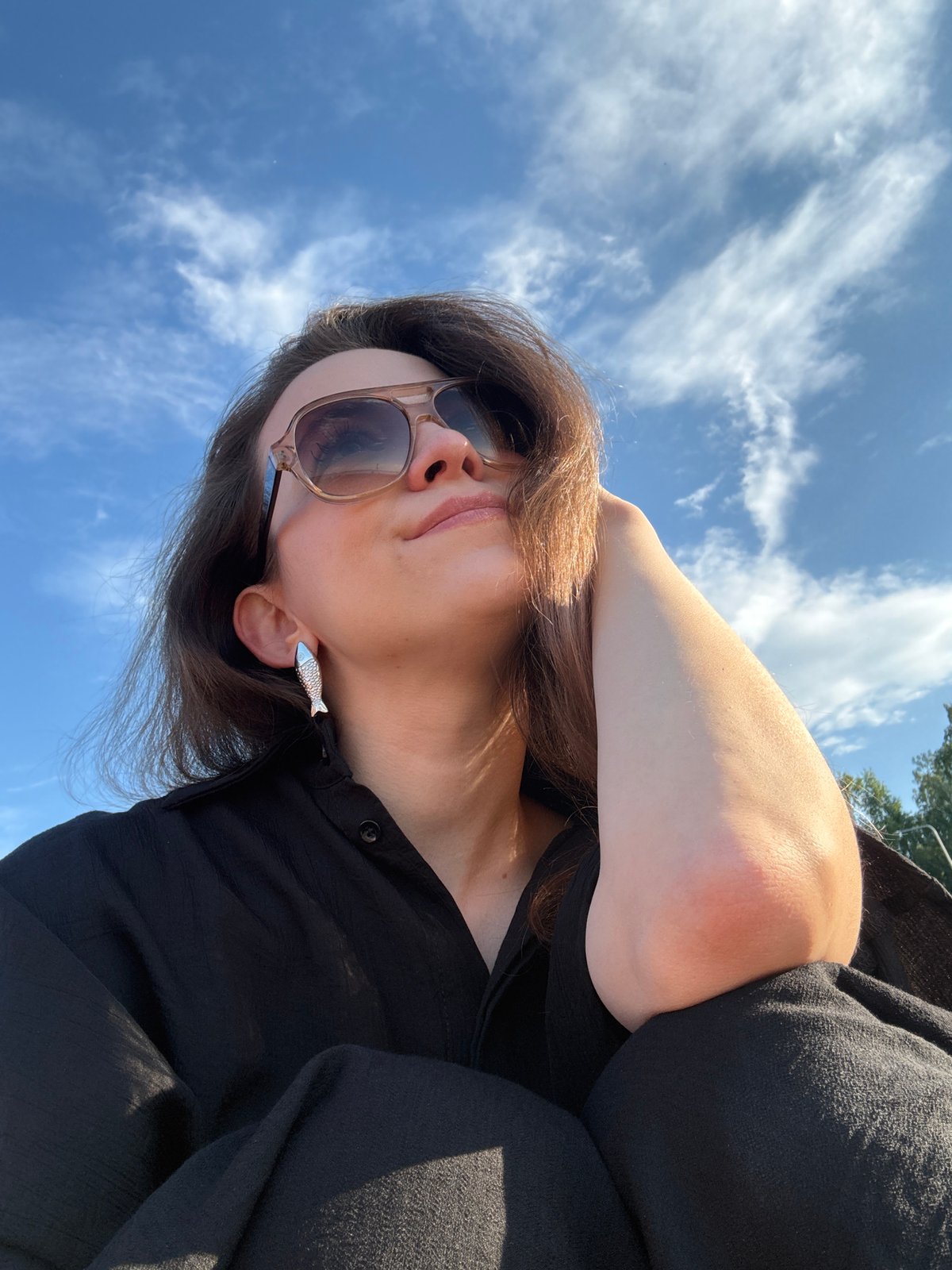 Woman documents beach visit with selfies in Chaikovsky, Russia