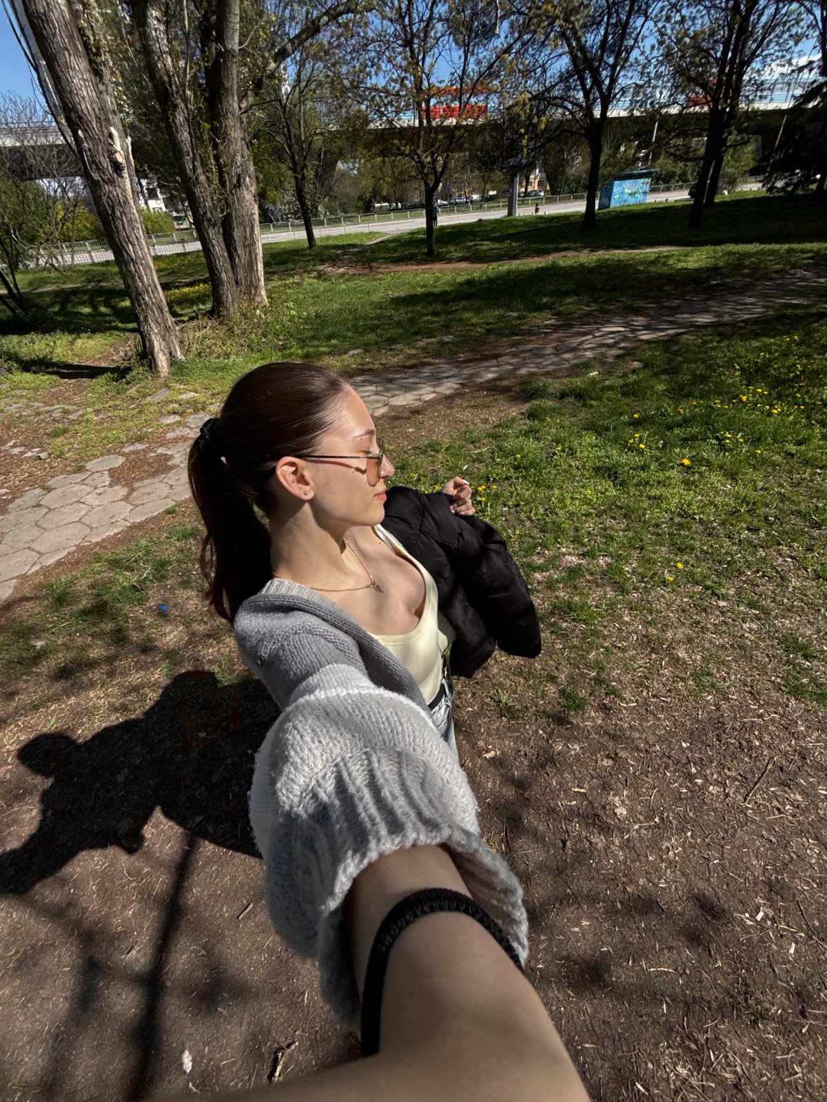 Woman and white dog enjoy quiet afternoon in Sofia