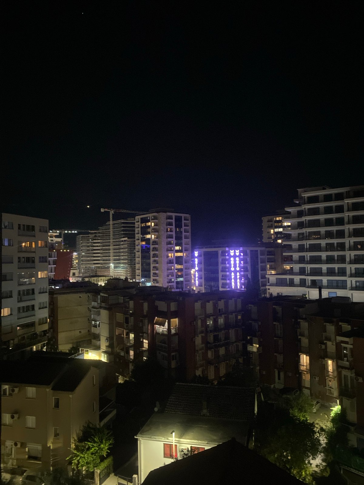 Gamer multitasks Dota 2 and poker in nighttime Budva