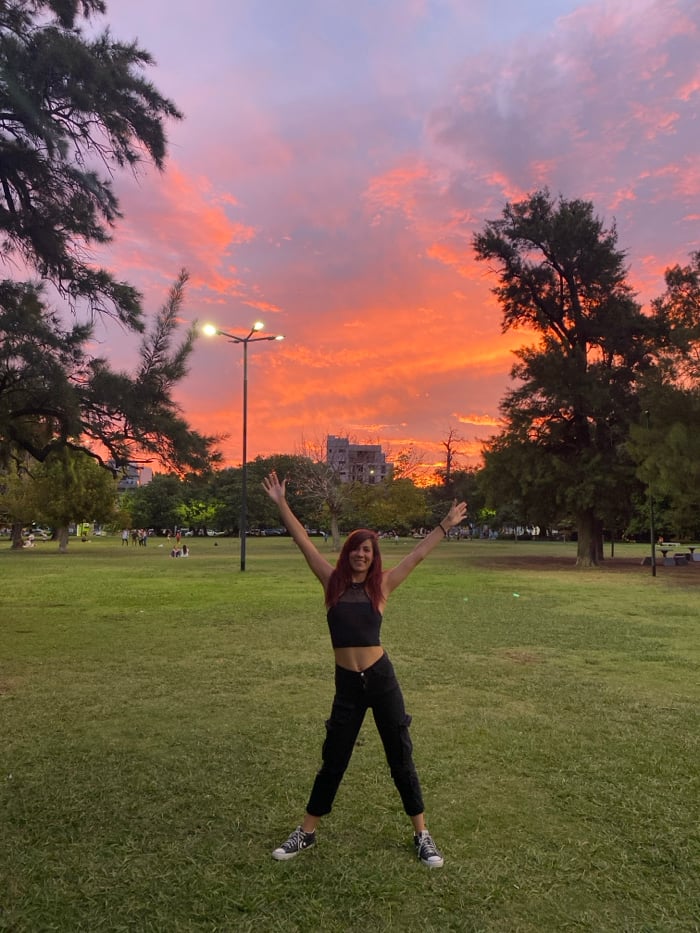 Acroyoga group practices aerial arts in Buenos Aires park