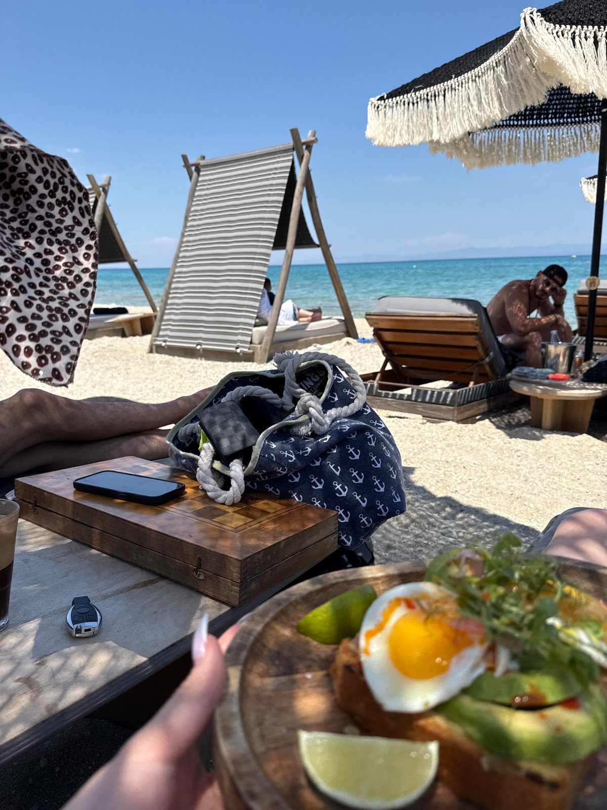 Beachside brunch and laptop time at a Greek beach club