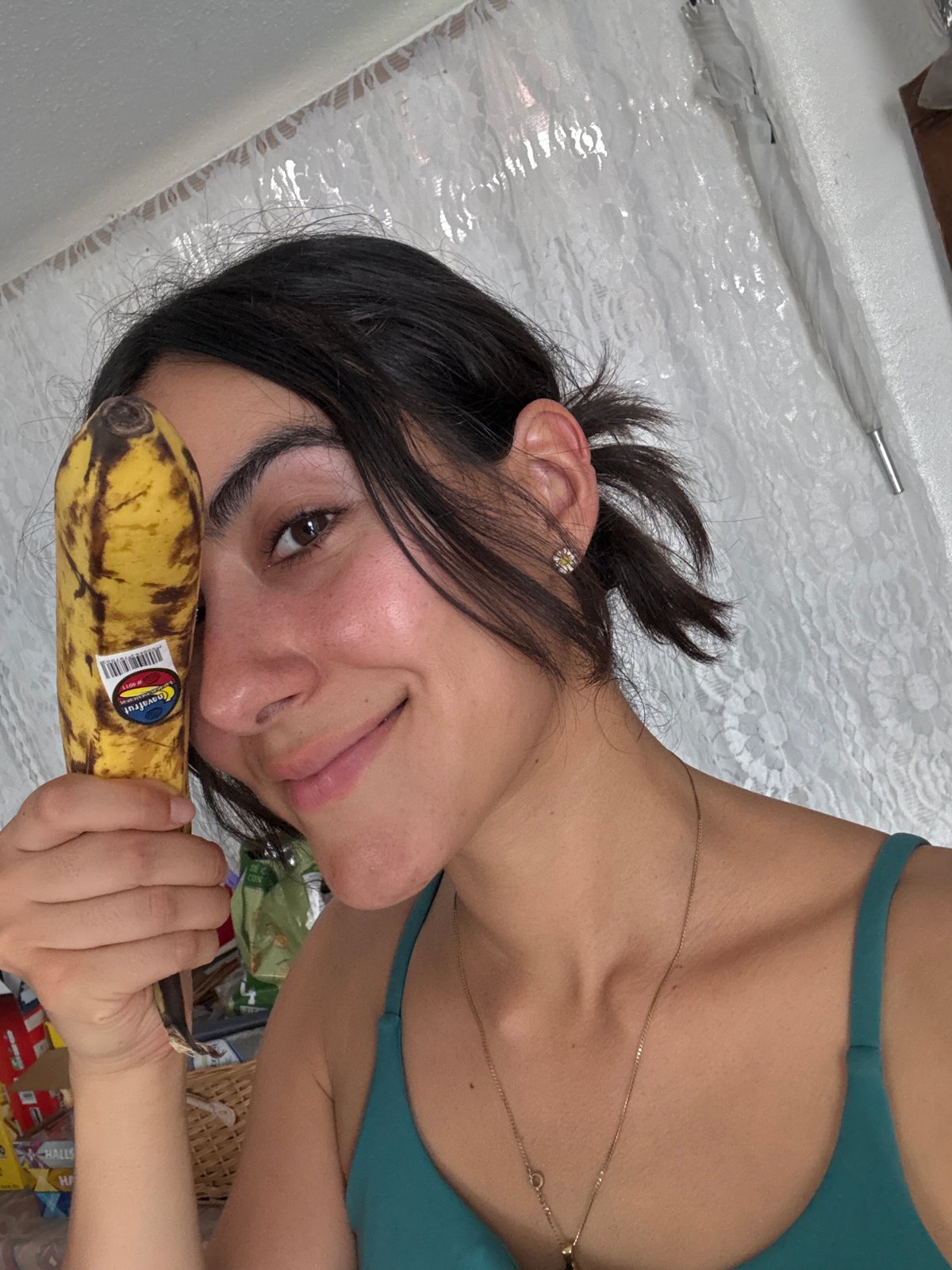Woman prepares banana and peanut butter snack in Puebla