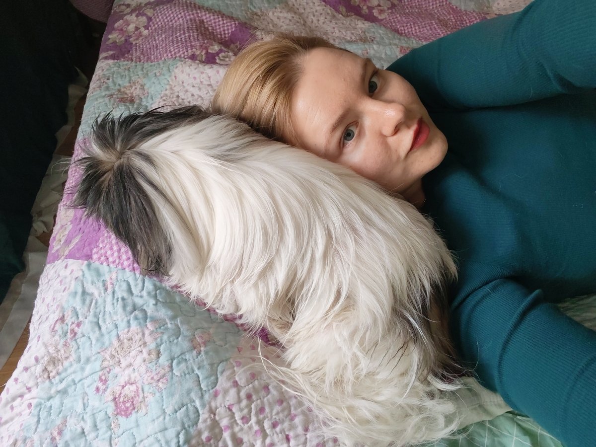 Woman's morning routine documented in Izhevsk apartment with pet dog
