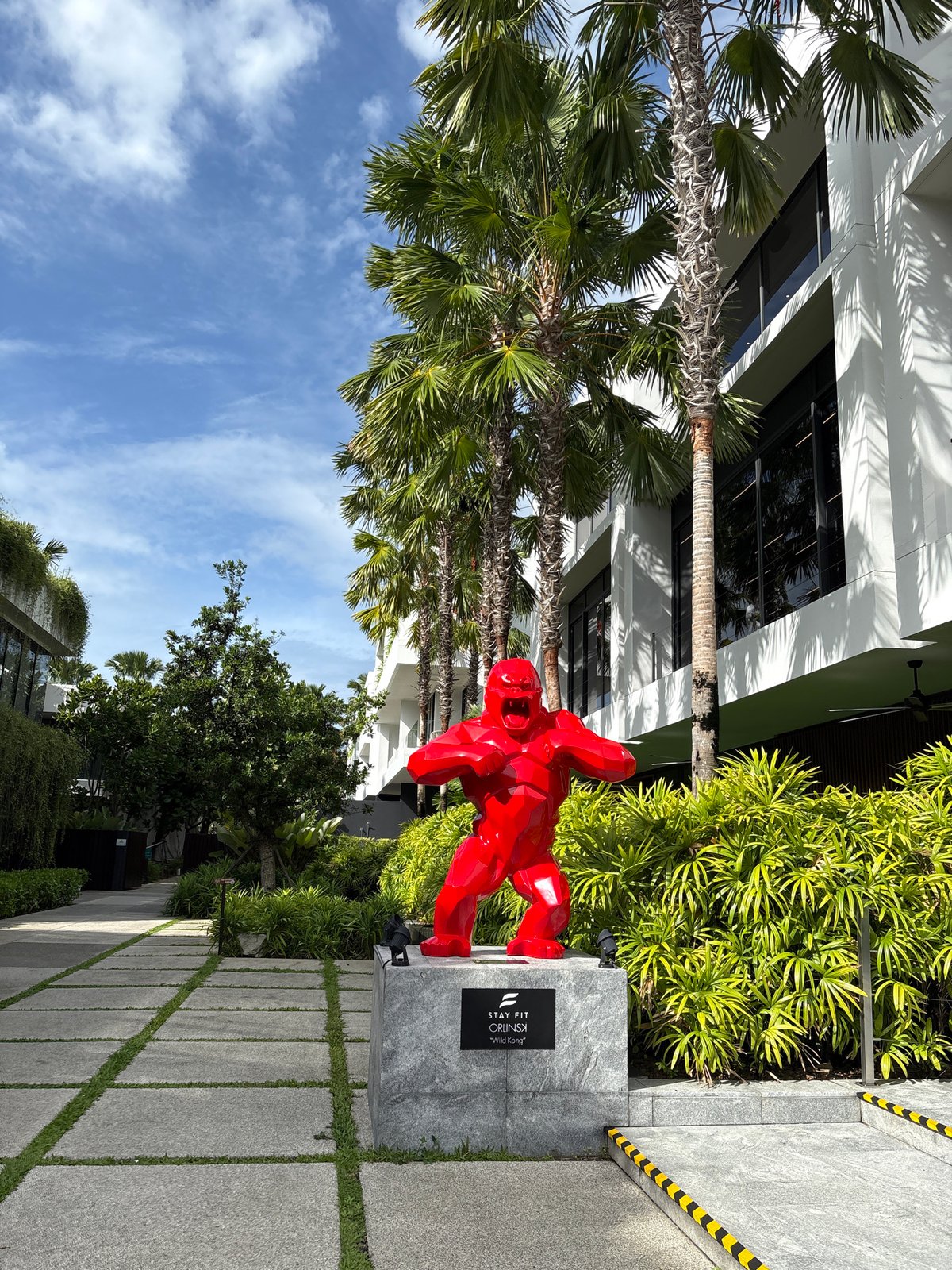 Red gorilla sculpture spotted on plinth in Rawai, Thailand
