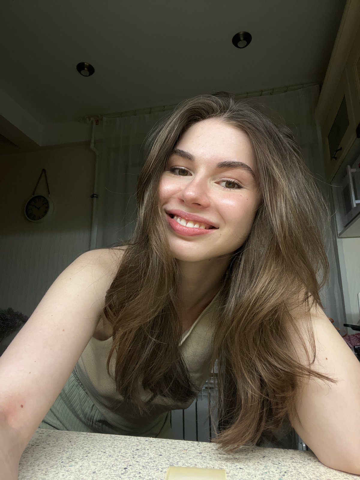 Woman photographed in kitchen sequence Saint Petersburg April 6