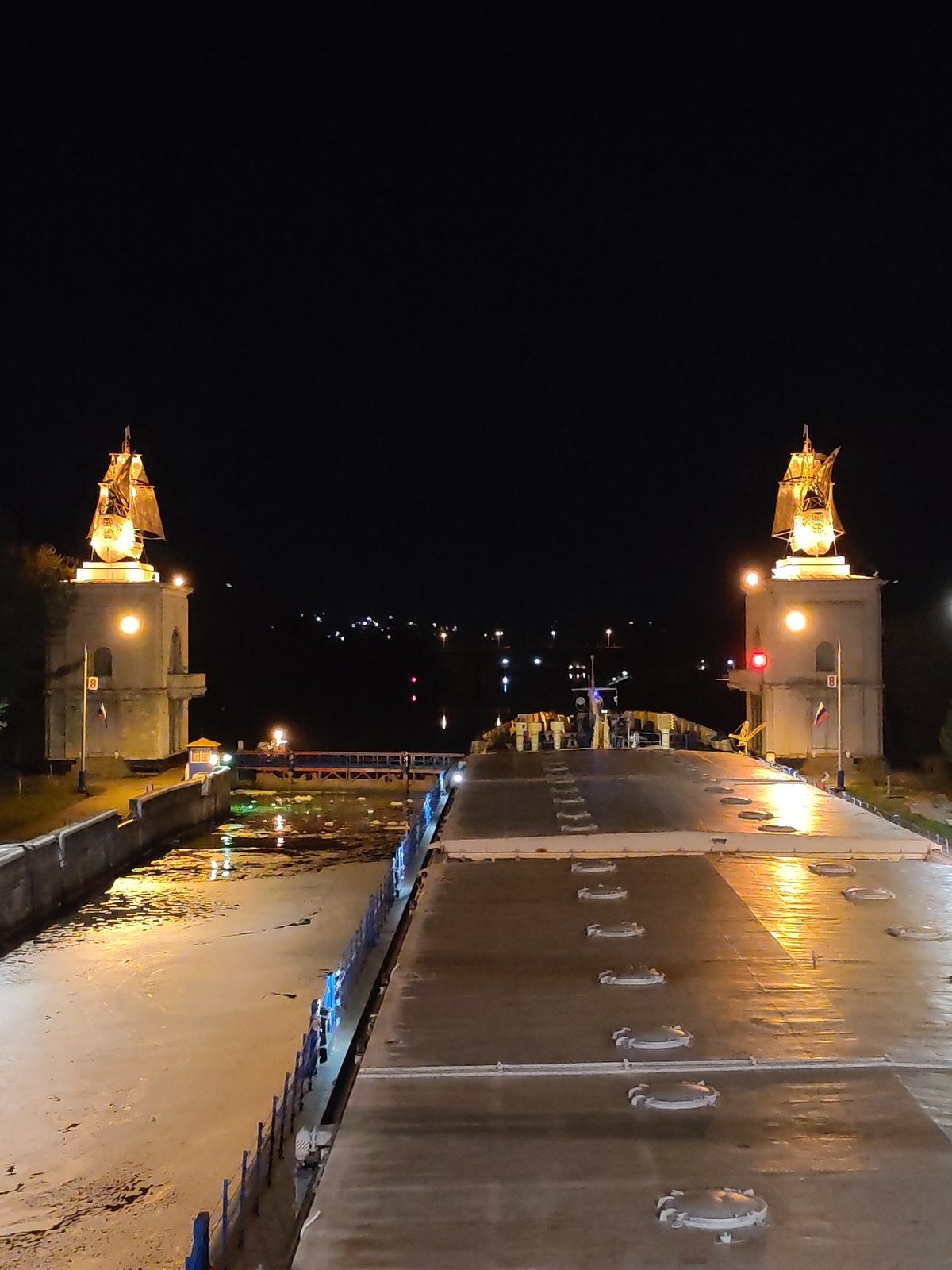 Cruise ship transits Moscow Canal locks in Yakhroma at night