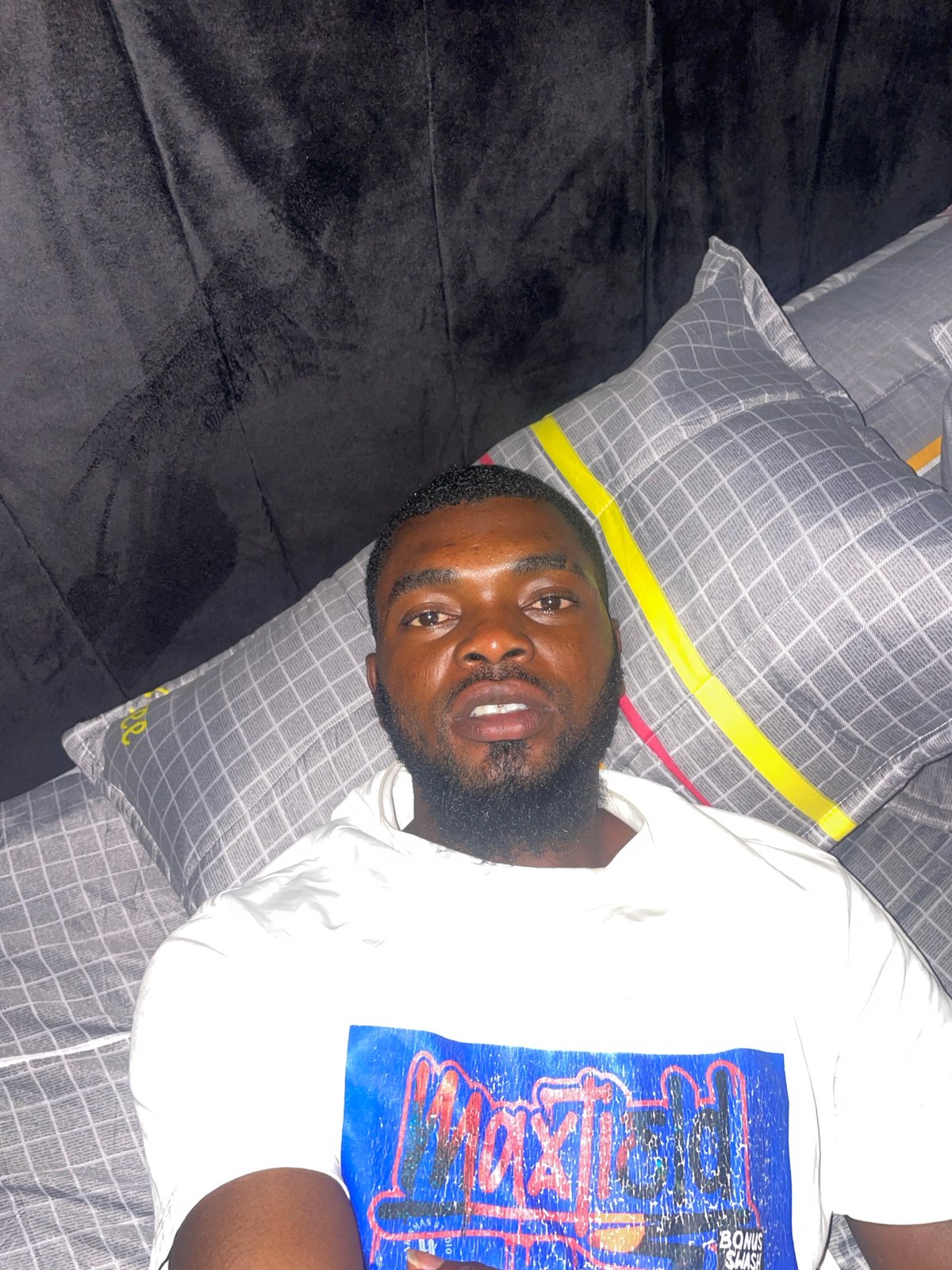 Man resting in bed observed in Jos, Nigeria