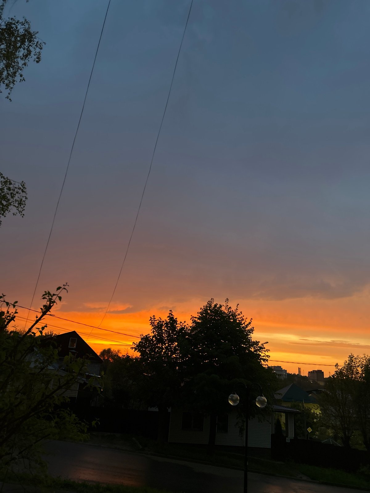 Dramatic sunset captured over residential Klin, Russia neighborhood