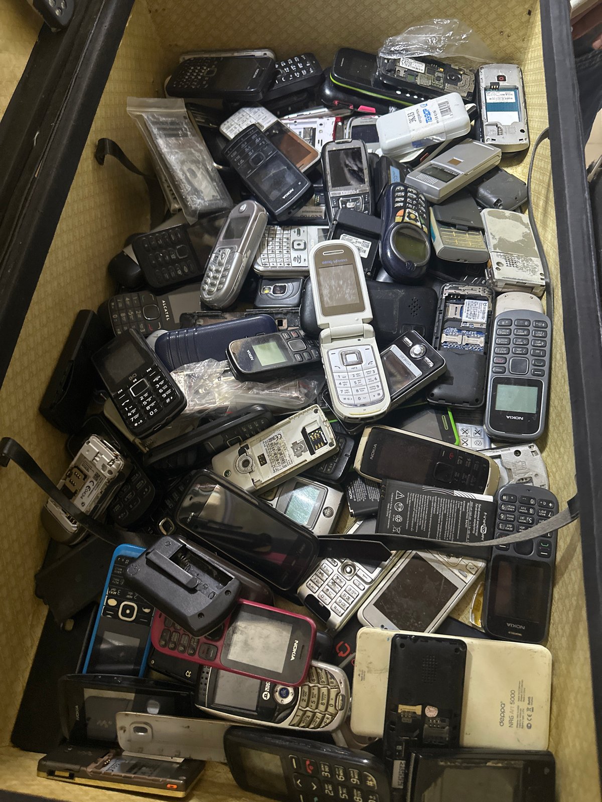 Vintage electronics collection documented in Russian village storage space