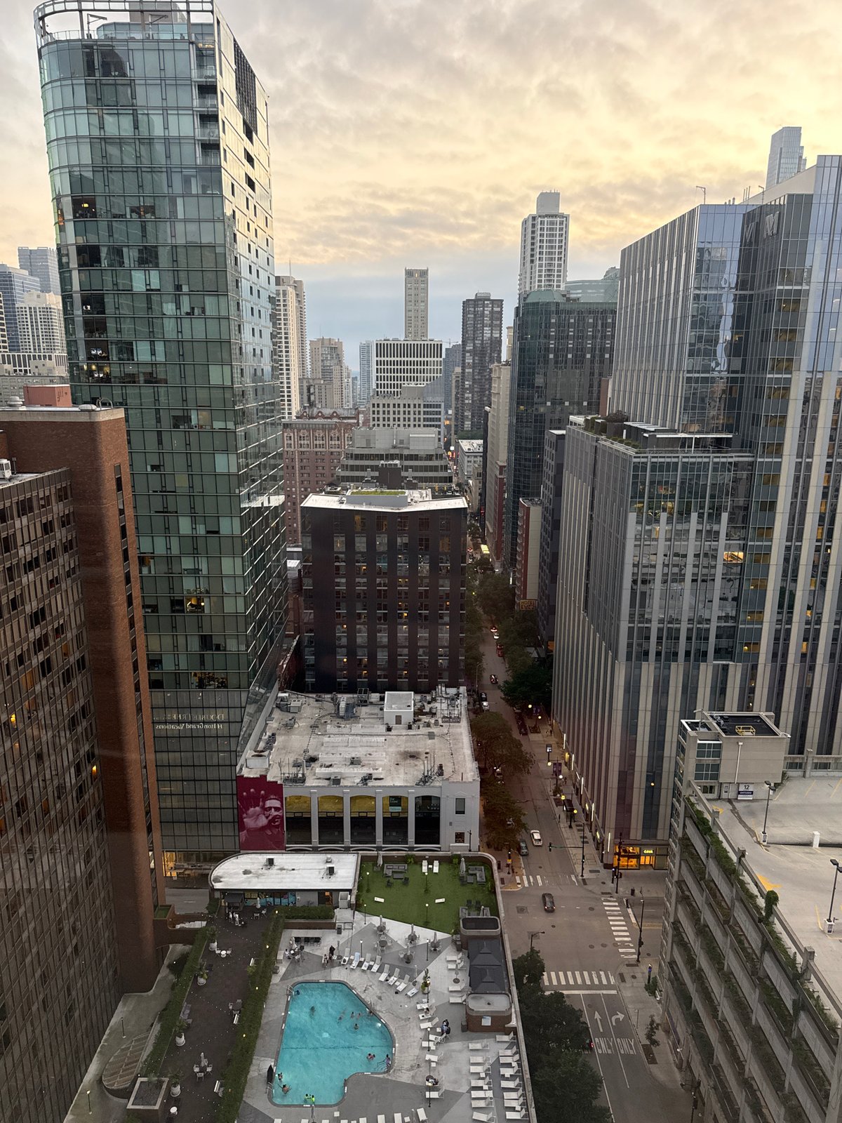Chicago rooftop pool and skyline at dusk, July 2026